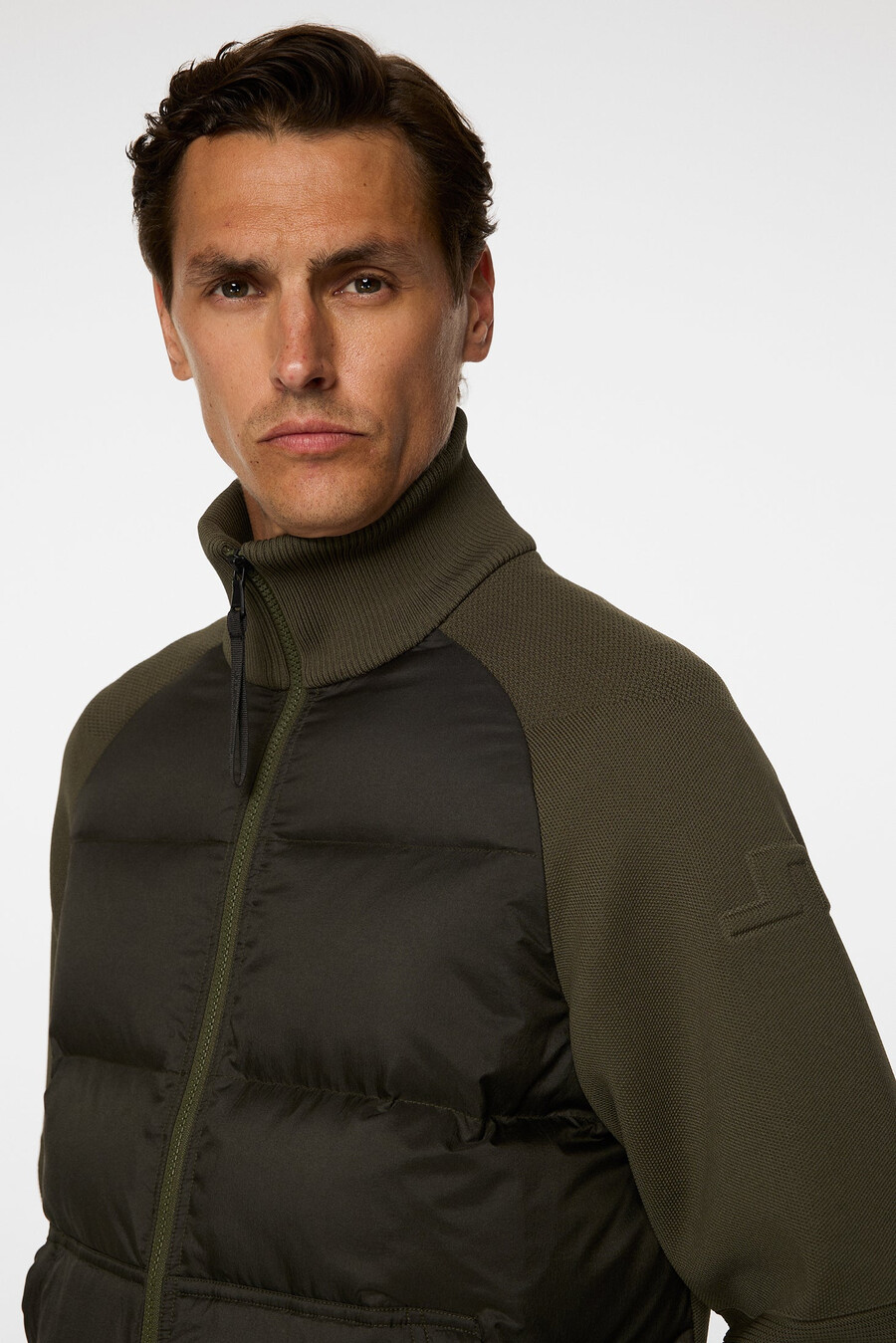 chaqueta híbrida de punto dome