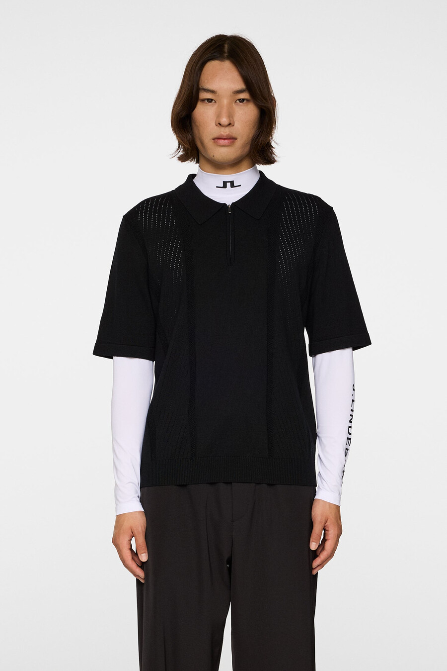 polo de punto con cremallera y estructura remy
