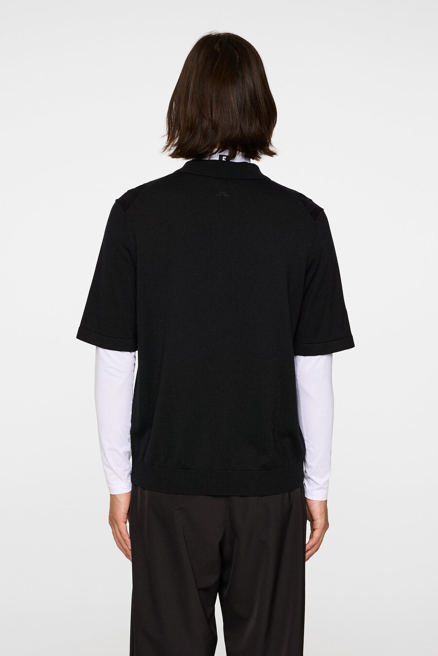 polo de punto con cremallera y estructura remy