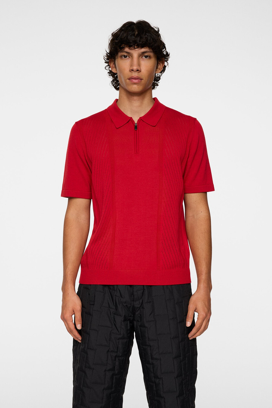 polo de punto con cremallera y estructura remy