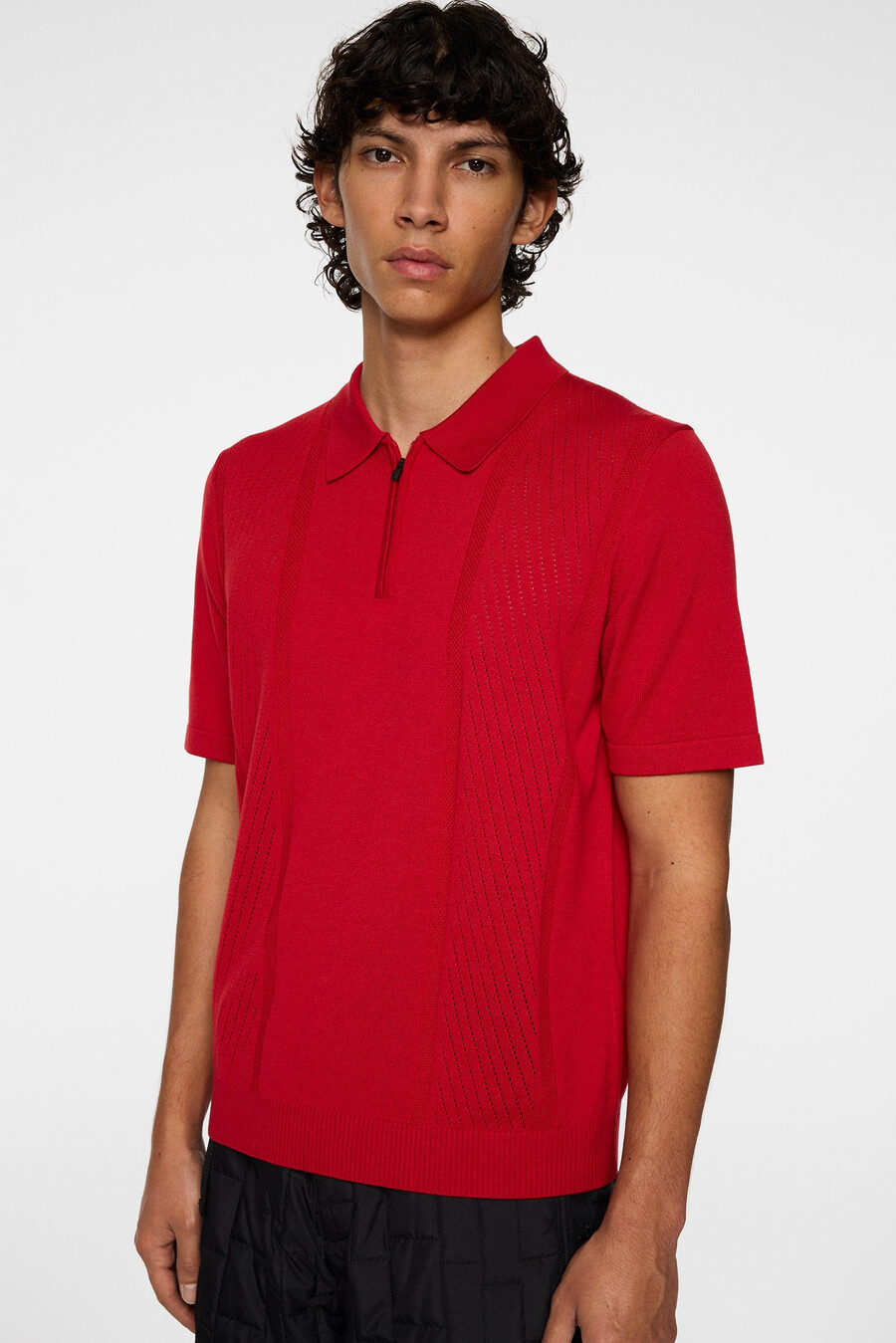polo de punto con cremallera y estructura remy