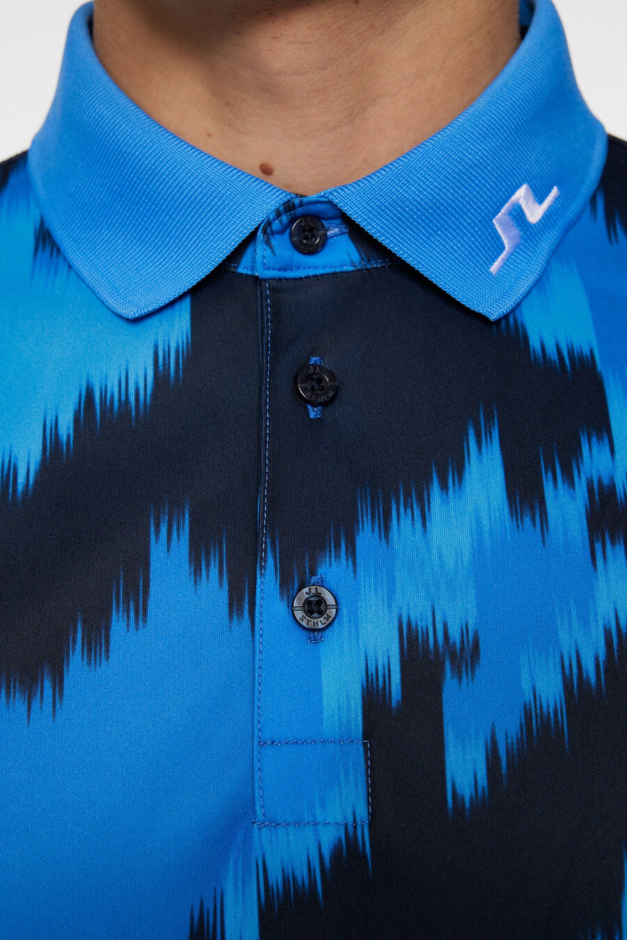 polo con estampado técnico tour