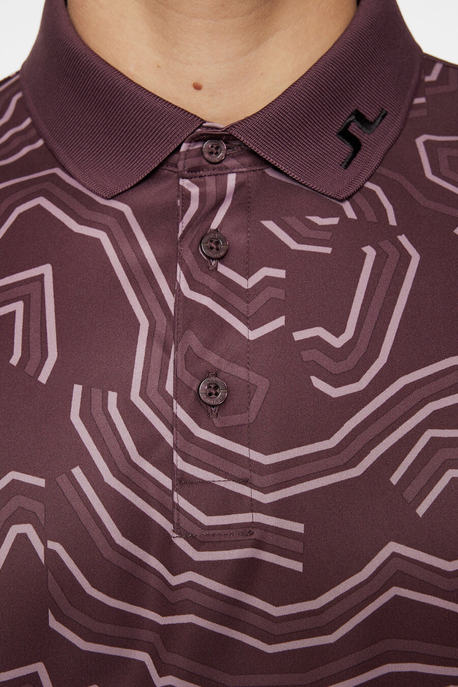 polo con estampado técnico tour