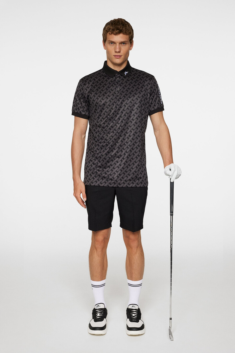 polo con estampado técnico tour