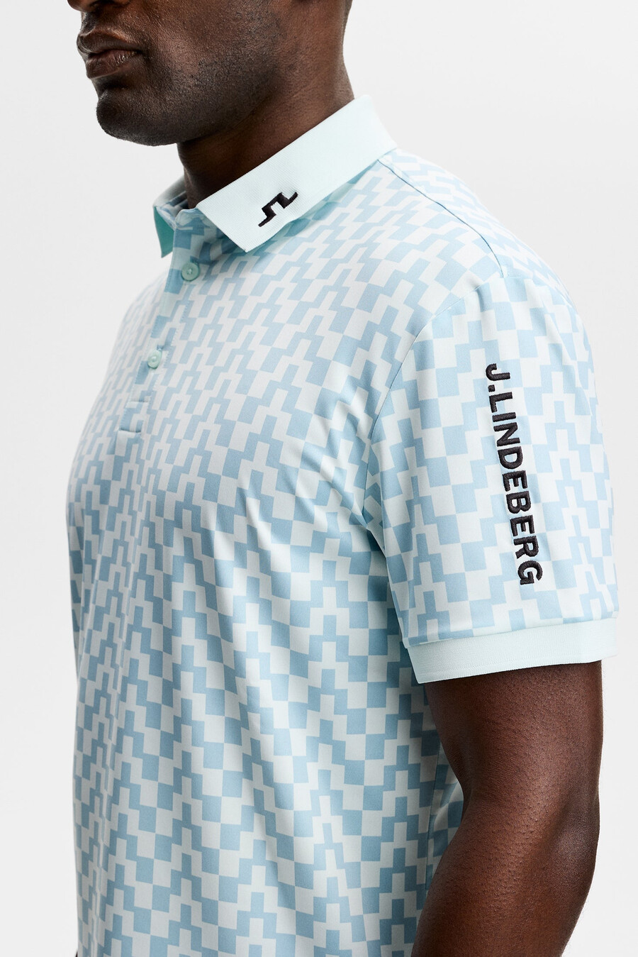 polo con estampado técnico tour