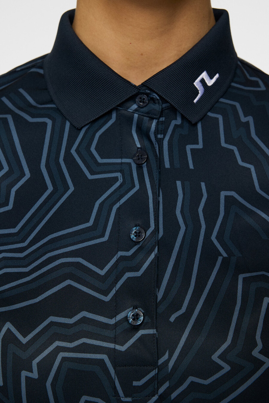 polo con estampado técnico tour